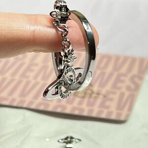 Vivienne westwood sliver cross over earings